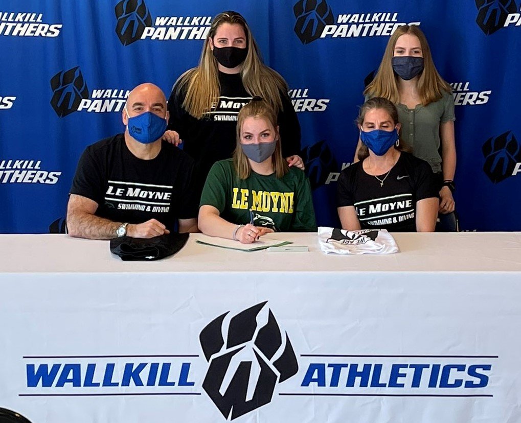 Wallkill High School senior swimmer Taylor Bonner signs her National Letter of Intent to continue her athletic and academic career at Le Moyne University in the fall.